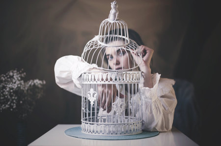 The girl and the empty cage